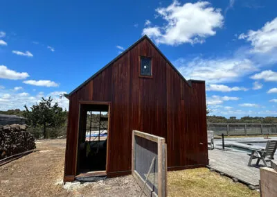 Timber-clad cabin on a hardwood deck