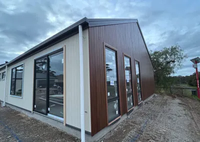 Timber-clad home with large windows